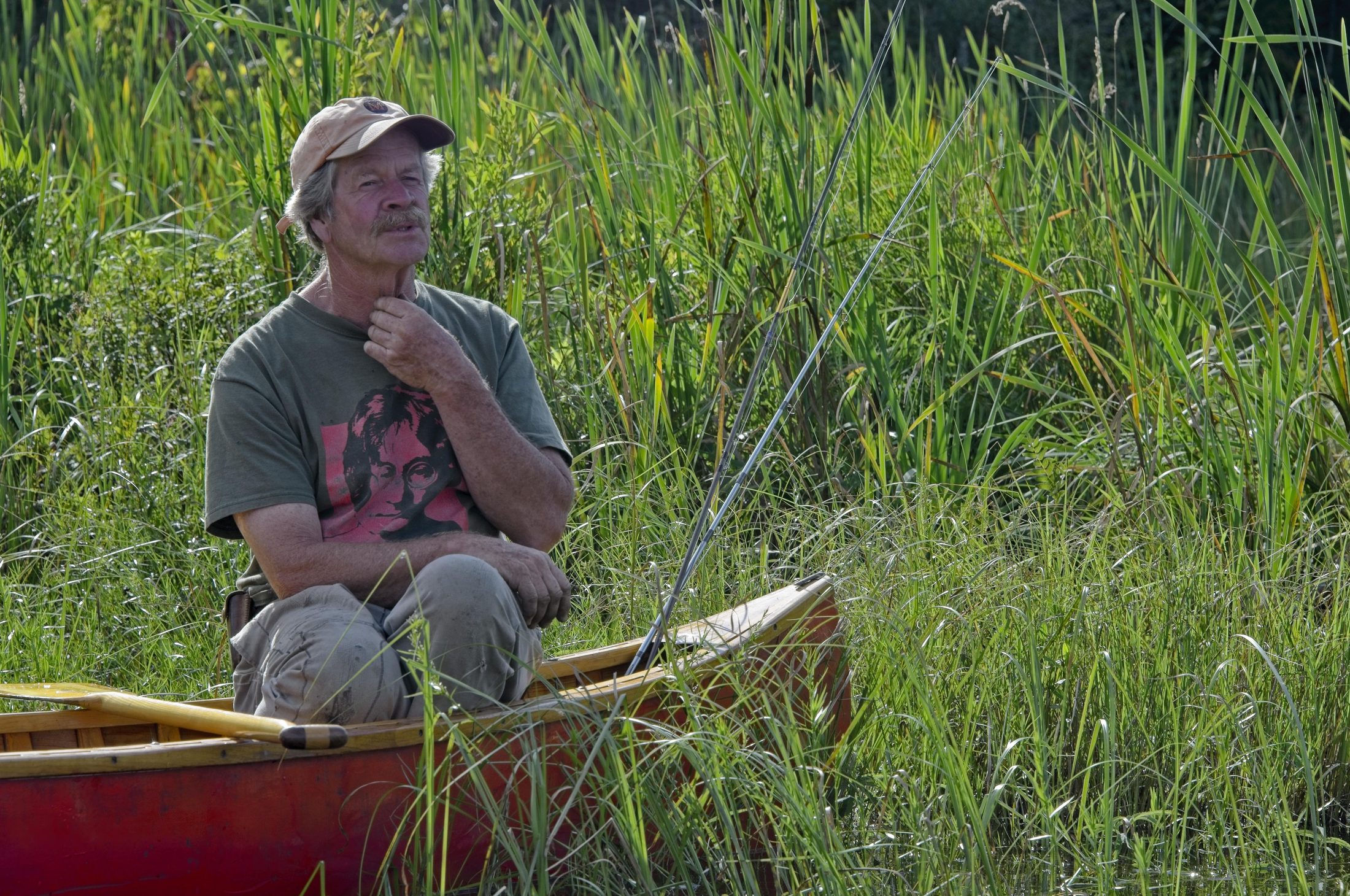 Man fishing from a canoe